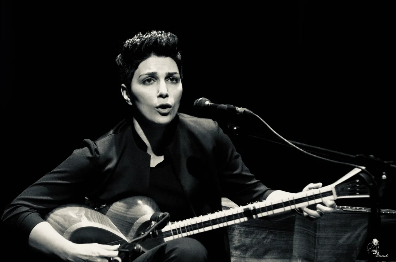 Elham Manouchehri, black-and-white portrait.